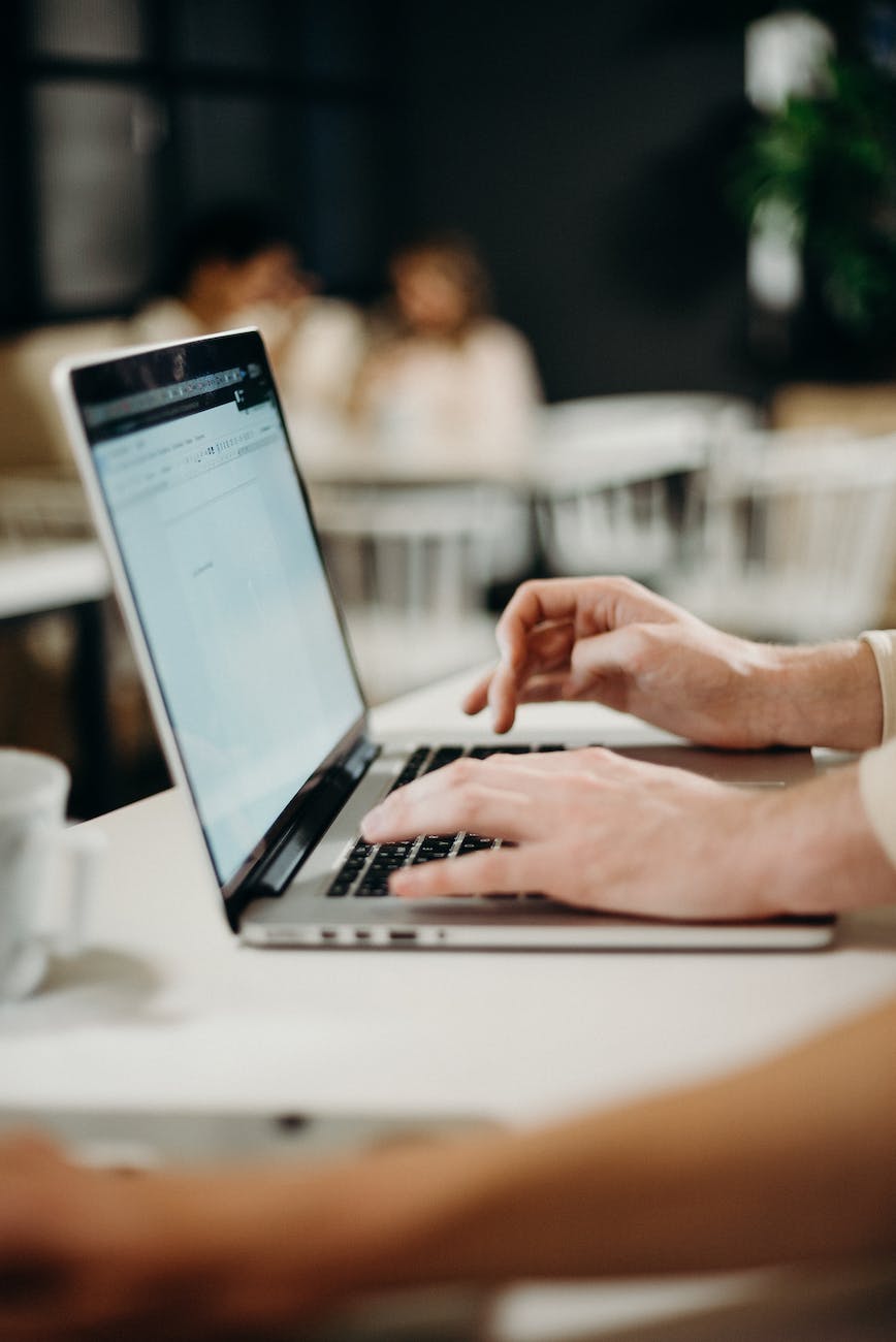 person using laptop computer